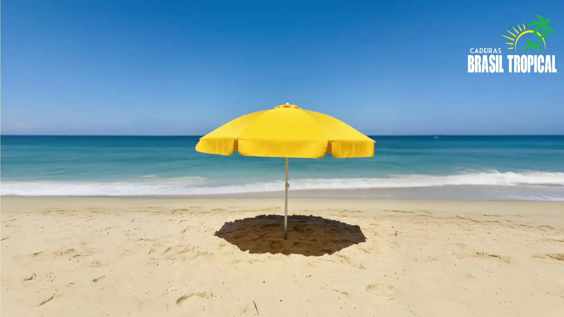 Imagem de um guarda-sol amarelo no meio da praia